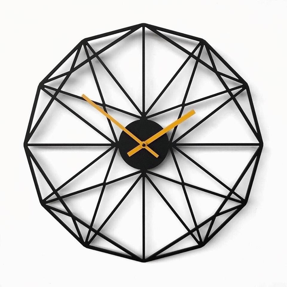 "Modern black geometric wall clock with gold hands on white background"