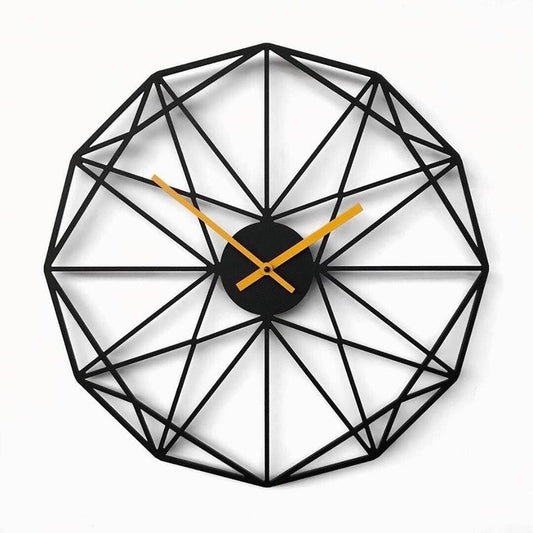 "Modern black geometric wall clock with gold hands on white background"