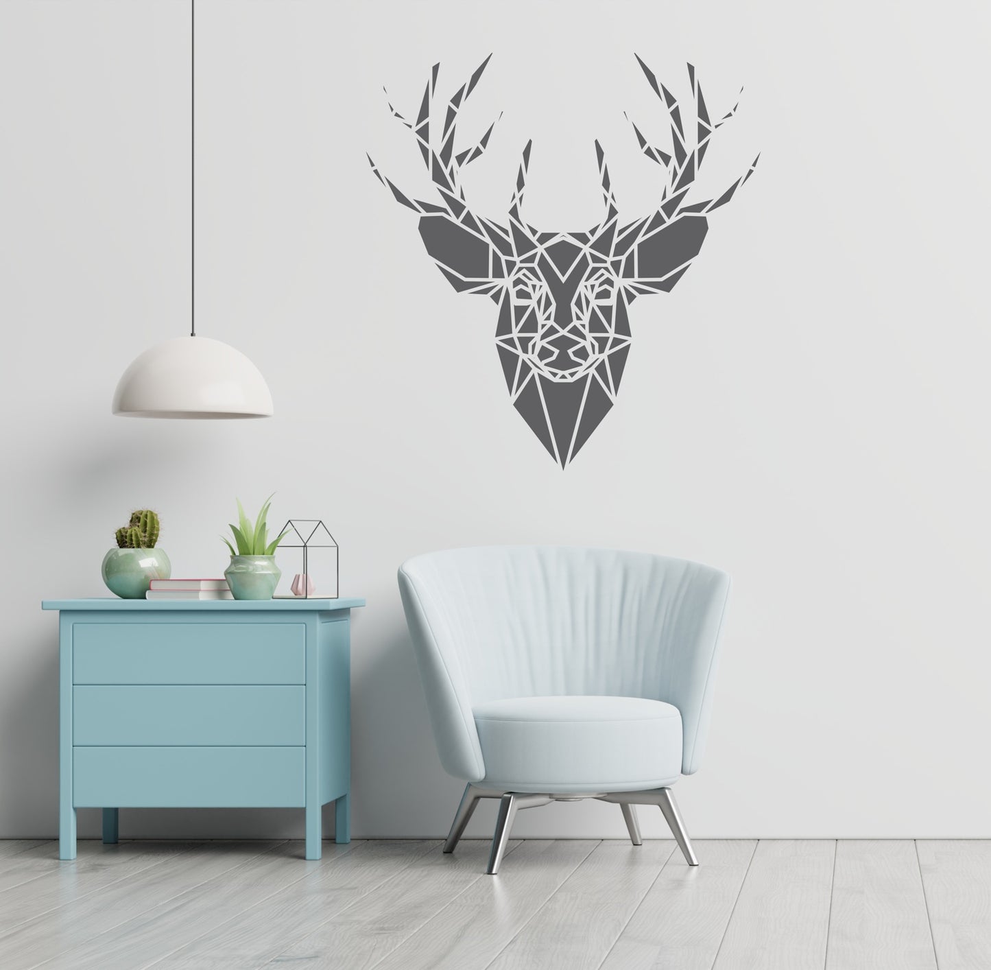 "Geometric deer head wall art mounted in a modern minimalist room with pastel furniture"