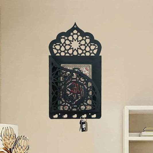 Wall-mounted Islamic Quran holder with intricate black MDF wood design, arched top, and key hooks for home and prayer room decor